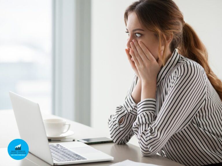 lady on laptop -shocked at mistake